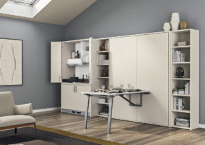 letto convertibile con cucina e tavolo a Varese